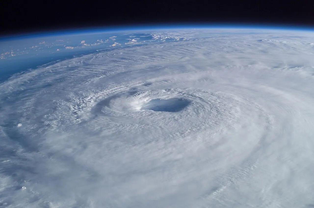 A large hurricane with a clear central eye photographed from the International Space Station.