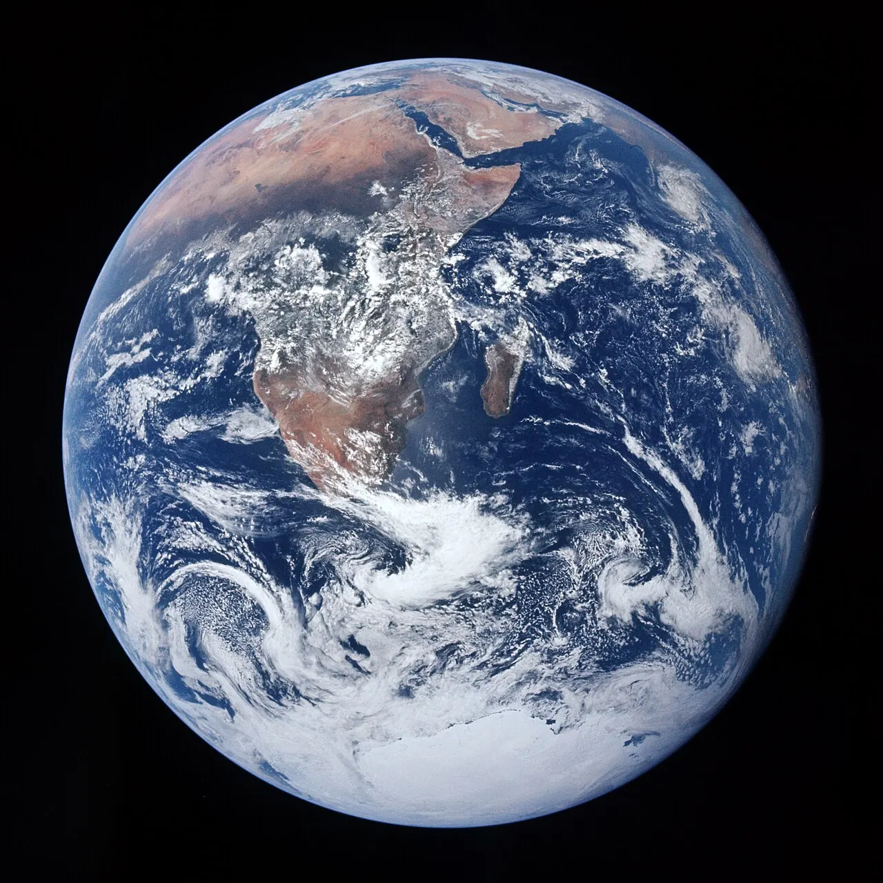 Photograph of the whole Earth taken by the Apollo 17 crew, showing Africa, the Arabian Peninsula, and Antarctica.